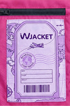 Featuring a pink background, the Icon Milano Windbreaker Rain Jacket showcases a pocket adorned with a purple boarding pass graphic labeled “WJACKET,” complete with globe, airplane, barcode, and marked spaces for date, flight, and weight. A subtle map fades behind the print—capturing the adventurous spirit that defines this Italian-designed women’s outerwear.