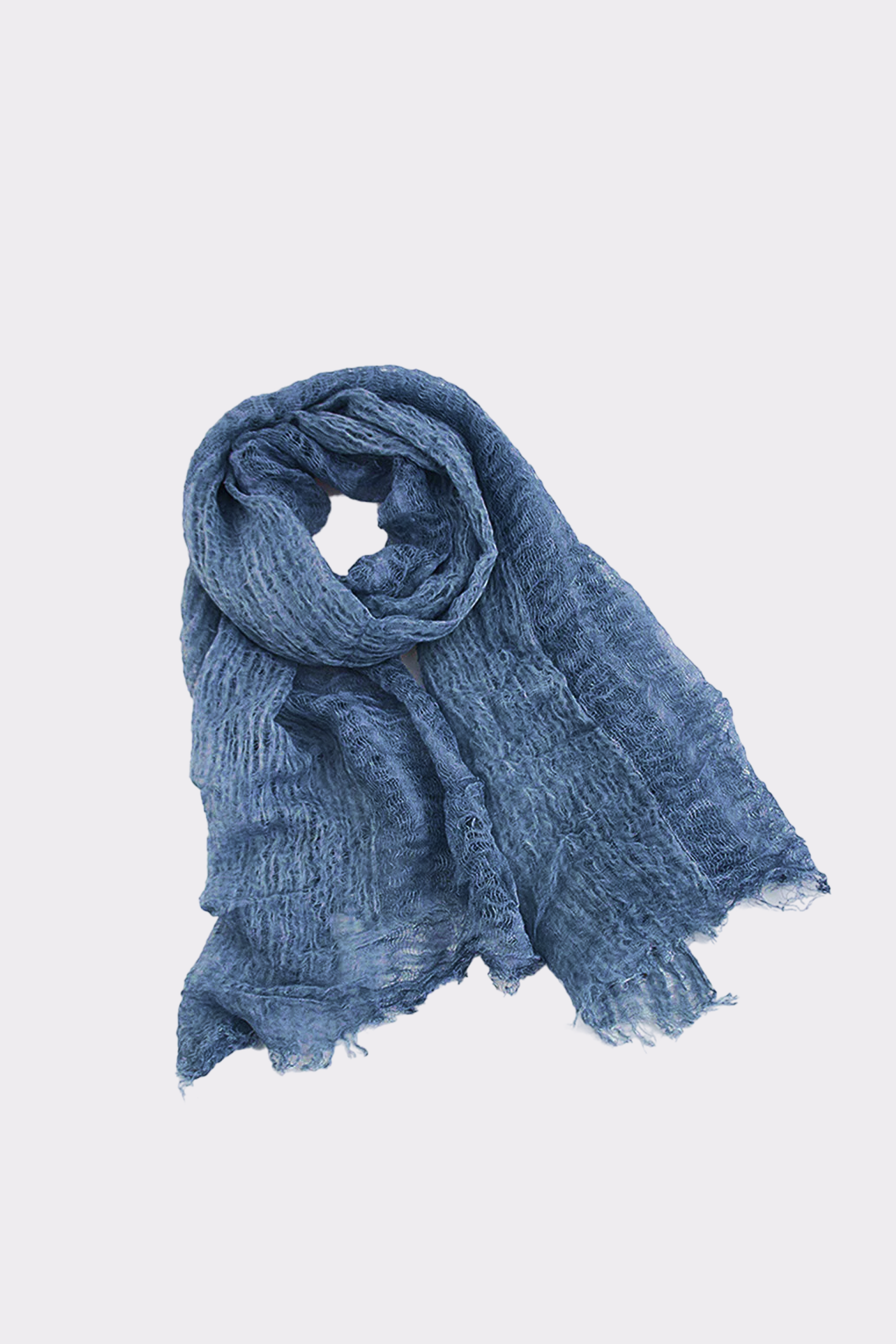 The Lightweight Linen Scarf, in blue with a crinkled texture and frayed edges, is laid flat on a plain white background—an ultra-breathable, versatile accessory ideal for any season.